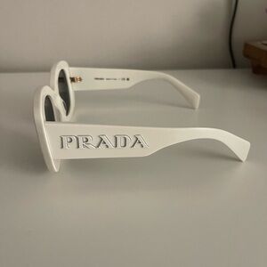 Prada Oversized Logo Oval Sunglasses in Bone
